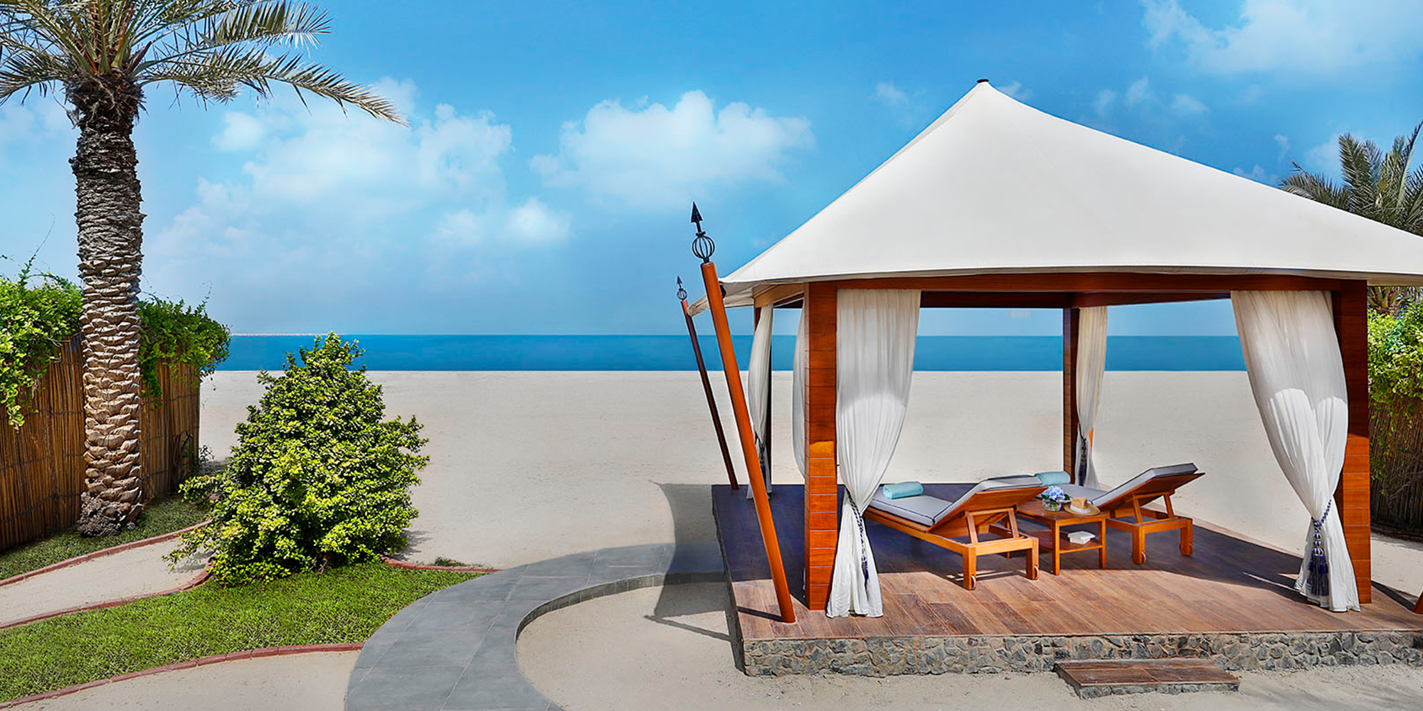 the-ritz-carlton-al-hamra-beach-views-cabana-2000x1000.png